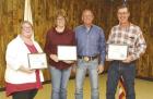 Adults who were honored for their contributions to the county 4-H program were (from left) Anita Rose, 4-H Volunteer Award; Marci and Duane Strine, Extension Appreciation Award; and Randy Rogers, 4-H Alumni Award. (Record Photo) 4-H achievements