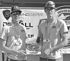 Rylan Wilkinson (left) and Spencer Cramer finished first and second in the trap shooting boy’s division in Conference 9.