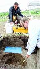 Shelby Beltz (above) with the Kansas State Historical Society and Nancy Arendt survey a storage pit that was located outside what they believe was a living unit for Plains Apache who once occupied the area around Lake Scott State Park. (Record Photo) Evidence should be enough to include site on National Register
