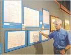 Artist and historian Jerry Thomas with the collection of maps that were used by Gen. George Custer while he served with the 7th U.S. Cavalry. The signed and dated maps were in his possession from 1866 until he was killed at the Battle of Little Bighorn in