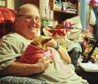 Cindy Hornback, with her dog, Mia, doesn’t know how she could survive without Medicaid assistance and monthly disability checks. (Record Photo) Loss of Medicare, home health is a worry for Scott City resident