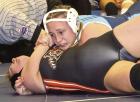 Tatum Brown, a 135-pound junior, collects near-fall points on her way to a 20-3 technical fall win over Britnee Hittle (Ulysses) during the Scott City Classic. (Record Photo)