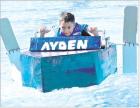 Scott City Middle School fourth grader Ayden Meza powers his way across the Scott City swimming pool during the annual boat regatta. Meza’s creative water craft was successful, as were nearly all of the unique boats and their captains. (Record Photo)
