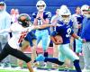 Scott City’s Pablo Solis stays beyond the reach of a Colby defender on a 56 yard punt return for a touchdown during Monday’s game on the home turf. (Record Photo)