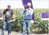 Adam York (right), CEO of Kansas Sorghum, and Andy Hineman, a Lane County producer and president of the Kansas Grain Sorghum Commission, address those attending the recent Sorghum Connections field day in Lane County. (Record Photo)