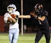 SCHS junior cornerback Adan Tarango grabs an interception during last Friday’s district win over Colby. (Record Photo)