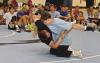 Jacob Frost throws his brother, Evan, to the mat while demonstrating a takedown during last week’s wrestling camp in Scott City. (Record Photo)